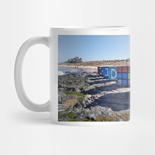 WW2 beach defences painted as dice, Rubic Cubes etc - Bamburgh, Northumberland, UK by richflintphoto